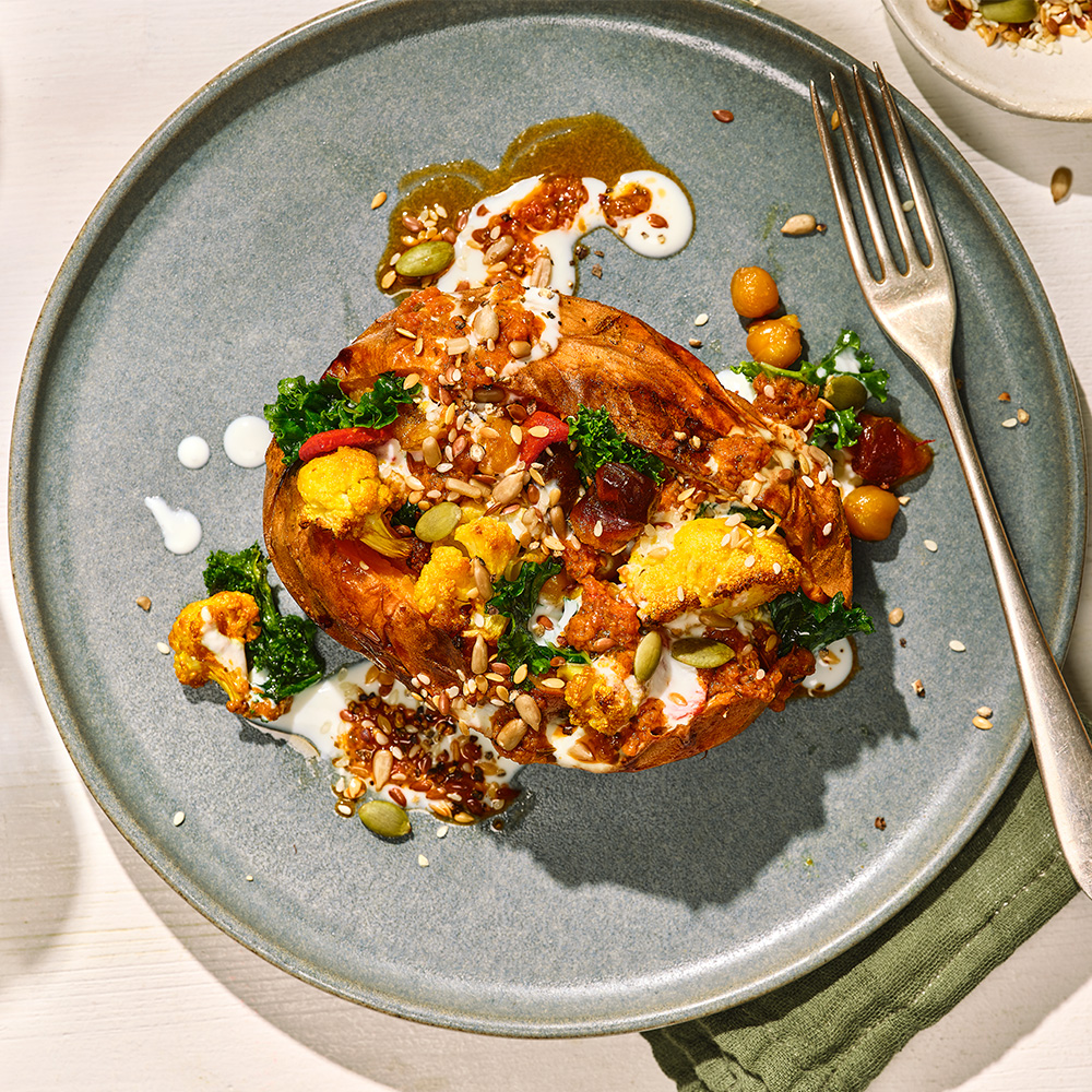 Loaded sweet potato on a serving plate