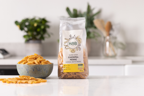 bag of H&B chikpea penne pasta on the side