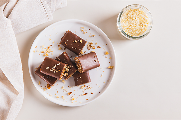 Protein bars on plate with powder