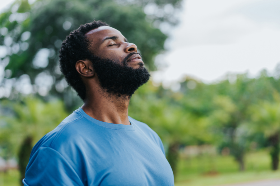 man connecting to his gut health