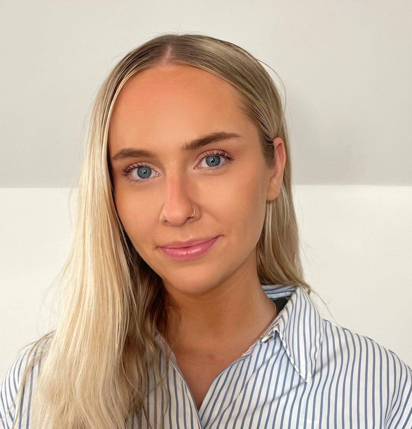 Molly Arnold smiling at the camera