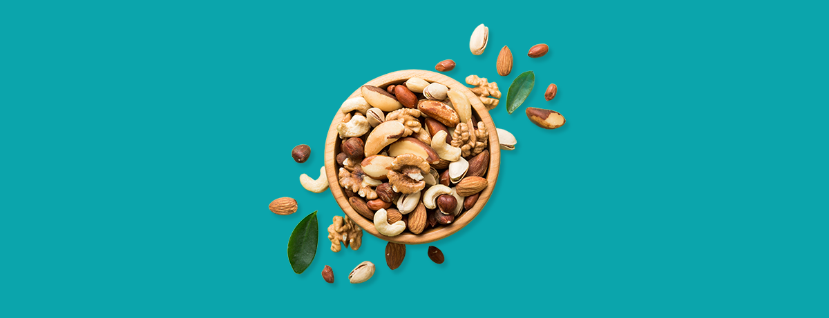 Nuts and seeds in a small wooden bowl