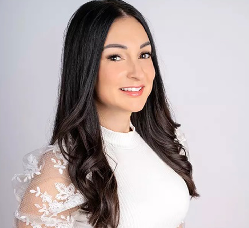 Karine Patel smiling at the camera