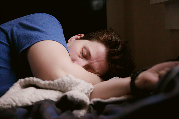 Close up of male sleeping on the bed