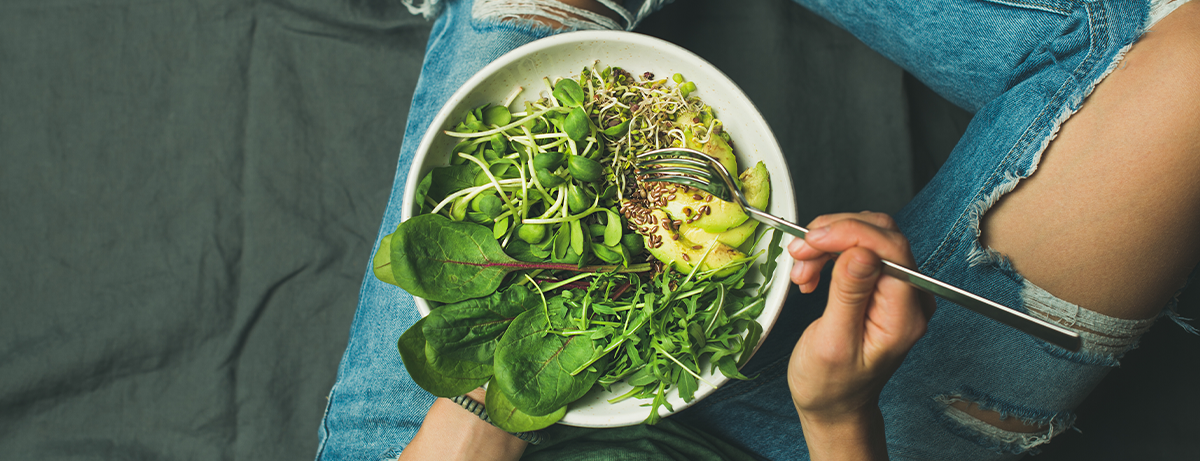 Close up of bowl on females leg