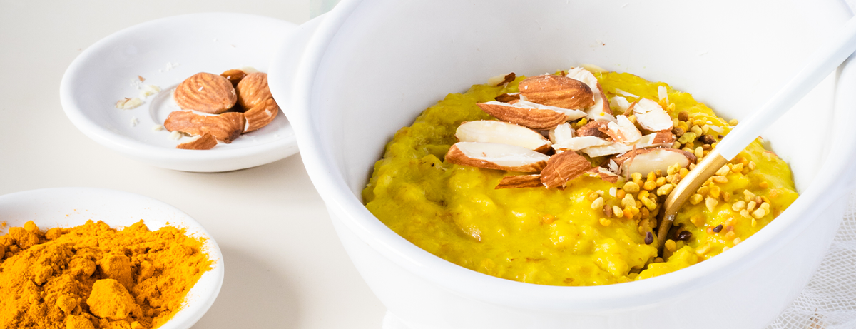 Portion of masala porridge on a white background