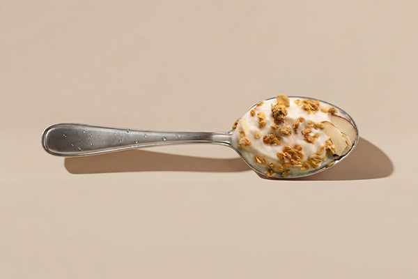 Spoon with cereal on