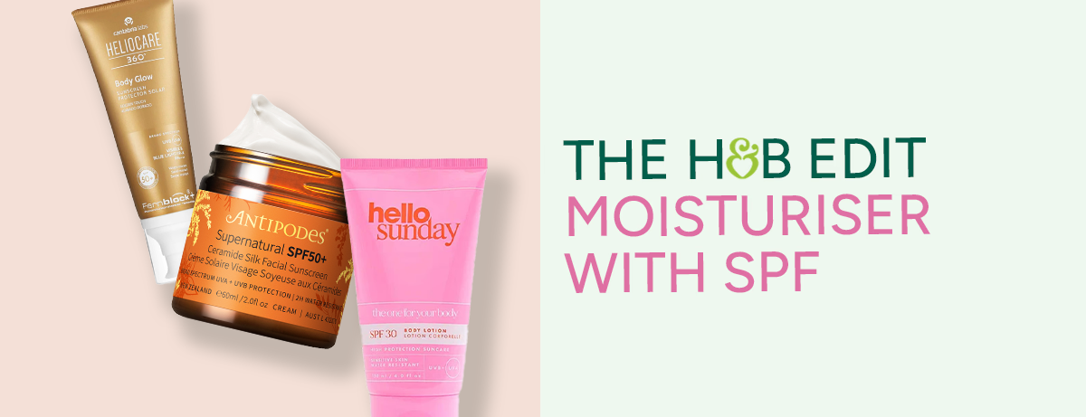 Selection of beauty products sitting on a pink background