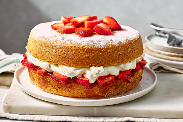 Victoria sponge cake on white plate