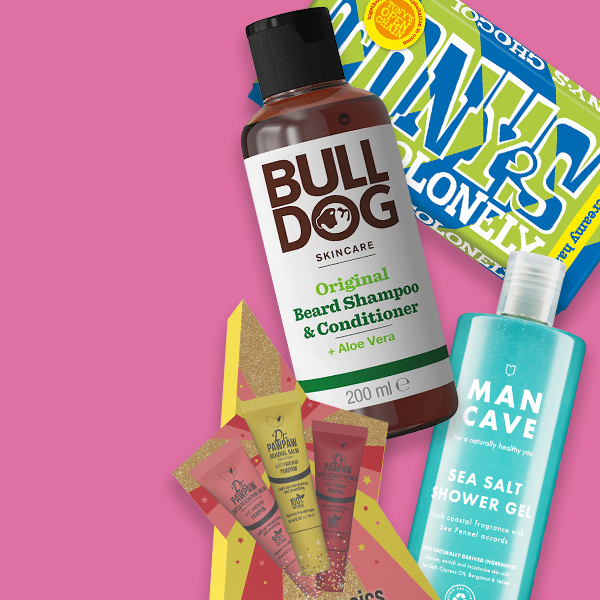 Selection of stocking fillers on pink background