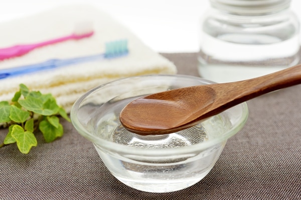 Coconut oil pulling - image of oral care