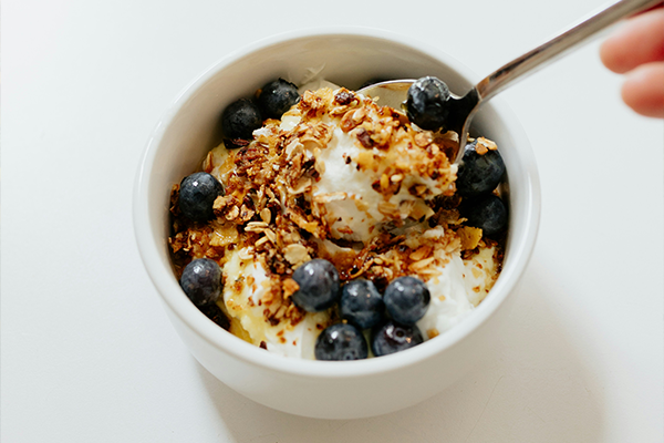 Portion of low gat greek yoghurt with granola