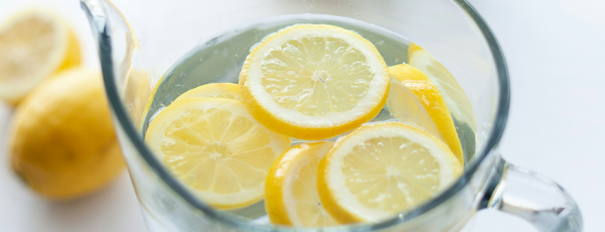 white glass drink lemon cup clean bright fresh lemons lemonade citrus lemon water tart pitcher jug slice water jug refreshment fruit water food