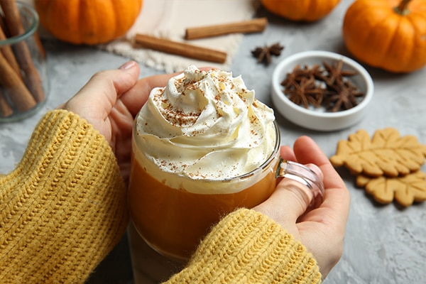 Pumpkin spices on a kitchen worktop background