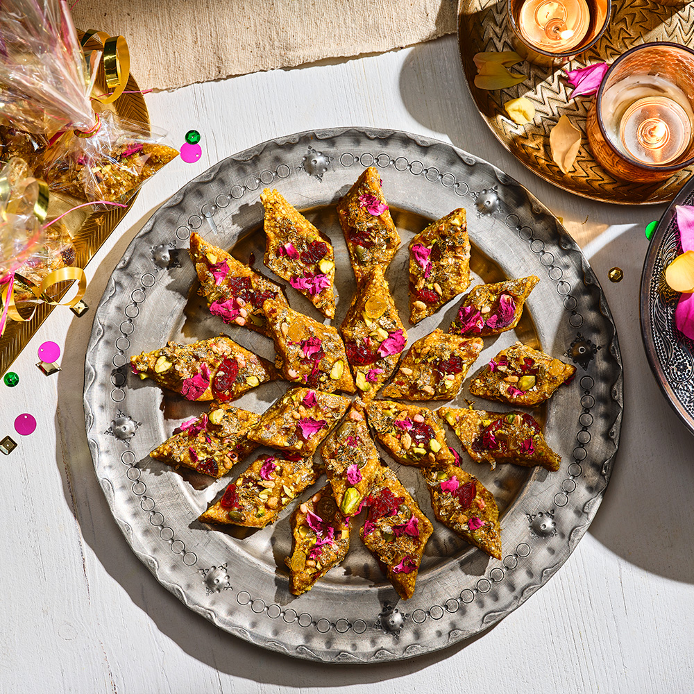 date and cashew bharfi inspired bites on a silver gifting plate