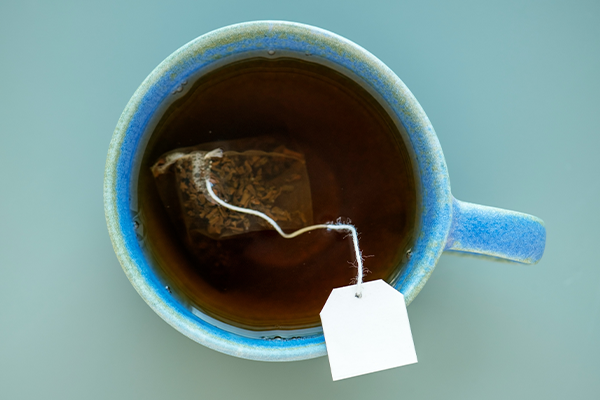 Assam tea on a blue background