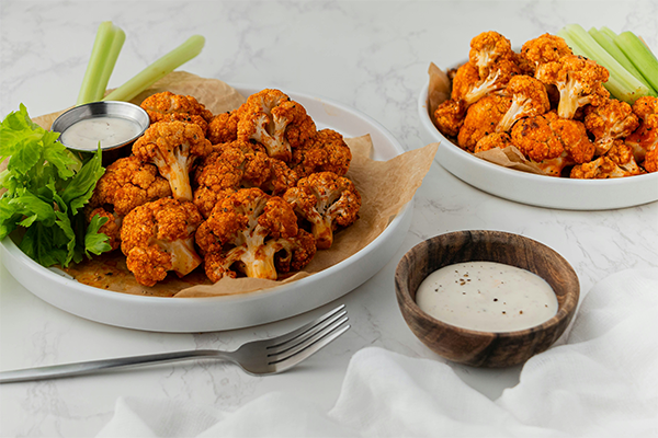 Portion of spiced roasted cauliflower on a marble worktop