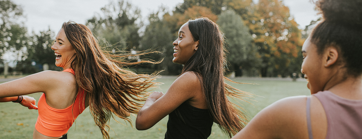 People in the park taking in part of group exercise class
