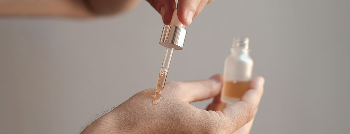 beauty serum being applied to hand