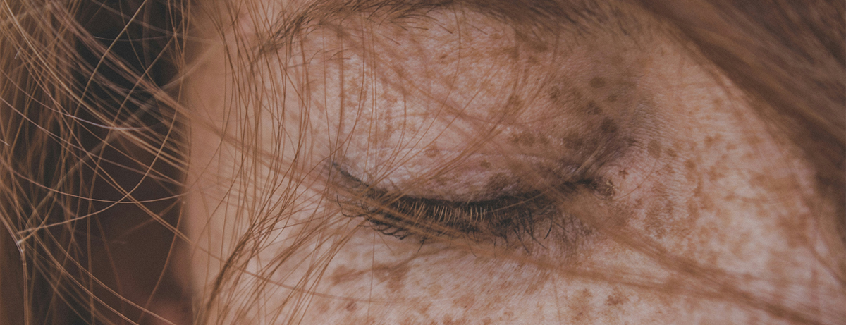 Close up of females face with freckles