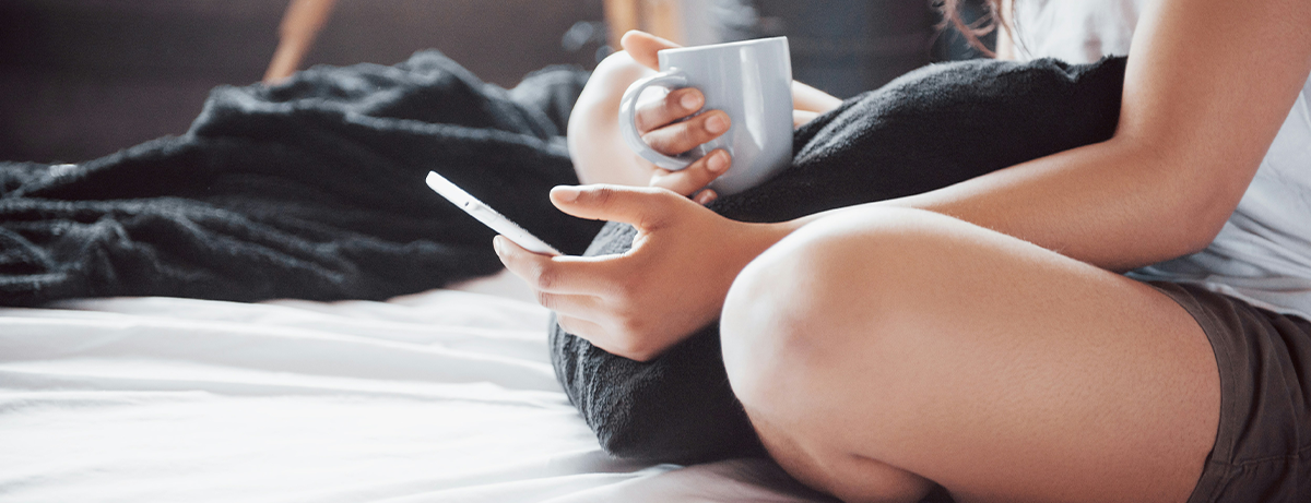 Female close up sitting on phone