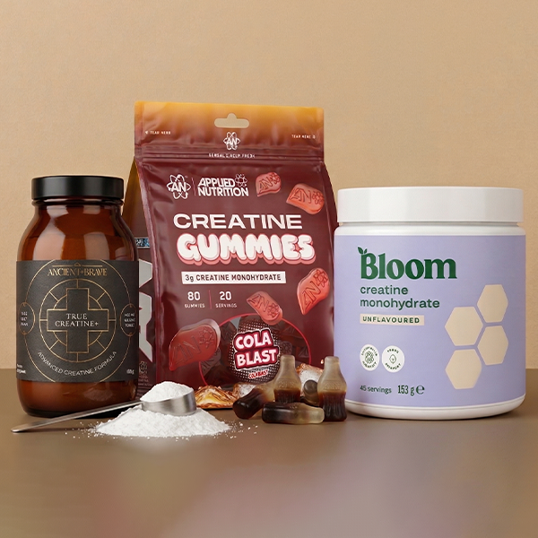 Creatine supplements on a beige background