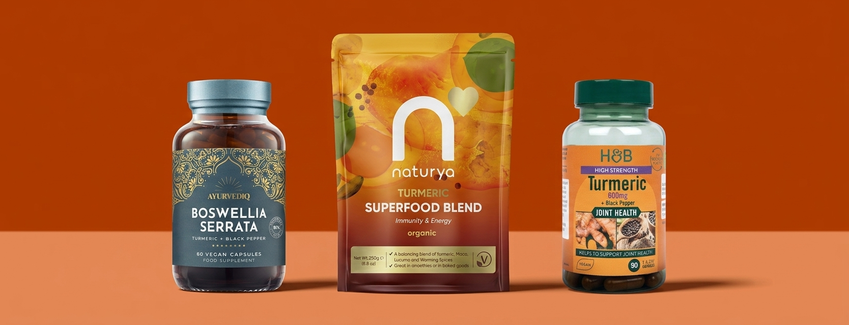 Selection of turmeric supplements on orange background