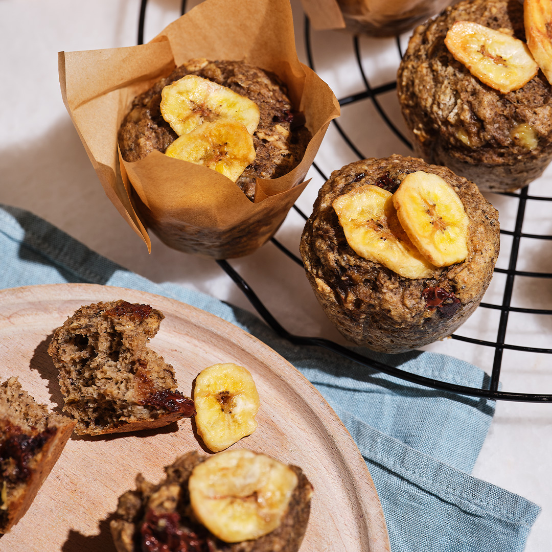 Selection of chocolate banana muffins on a baking tray