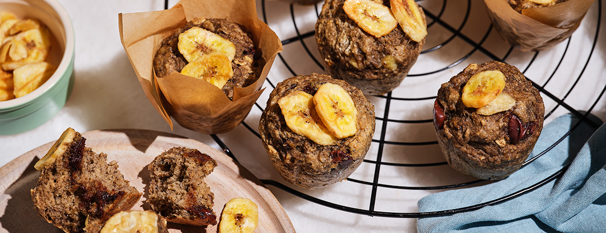 Chocolate and banana muffins on a cooling tray