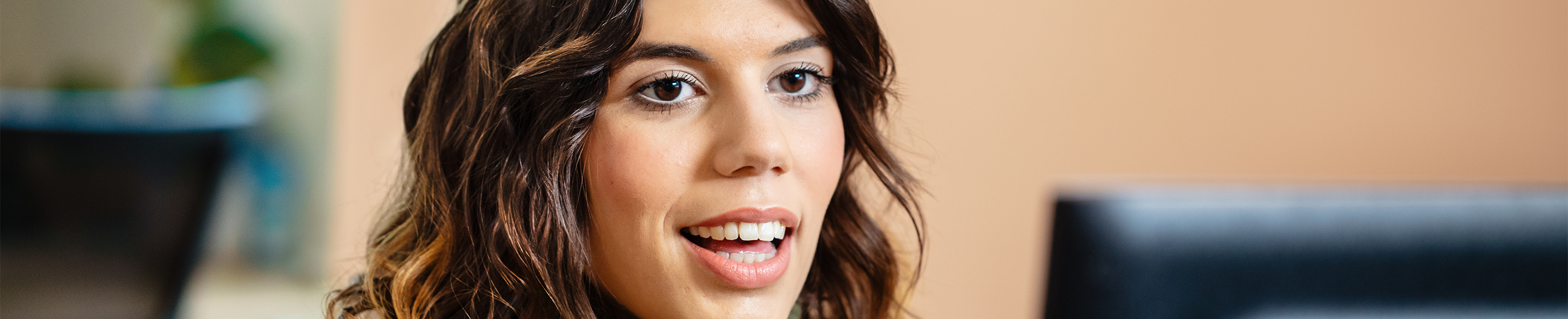 Female sitting in front of computer