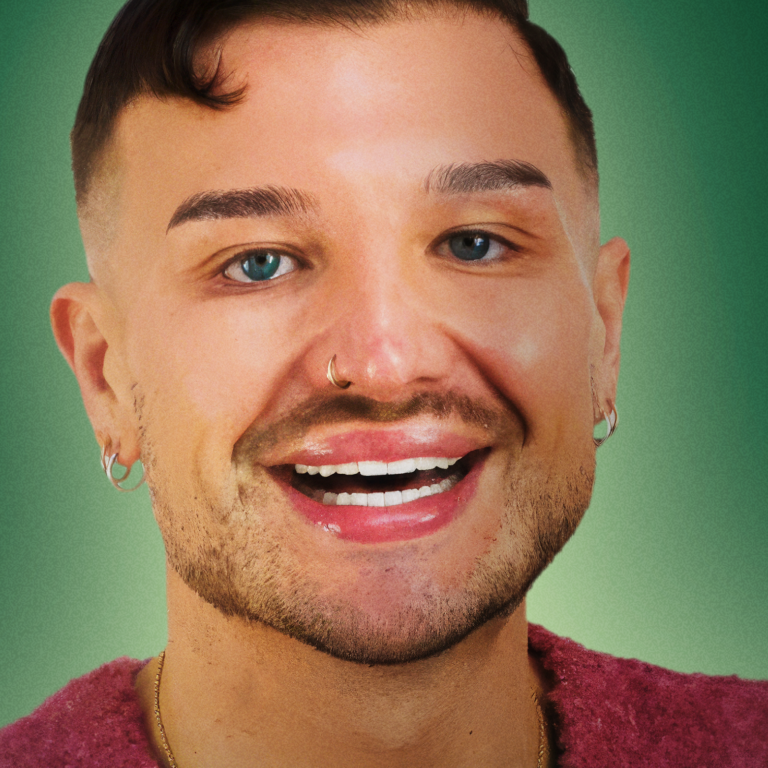 Danny beard smiling at the camera