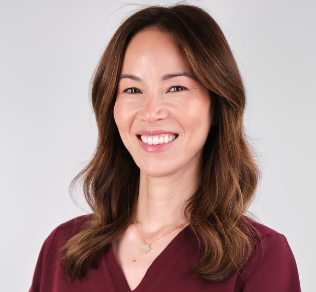 Dr Christina Hall smiling at the camera