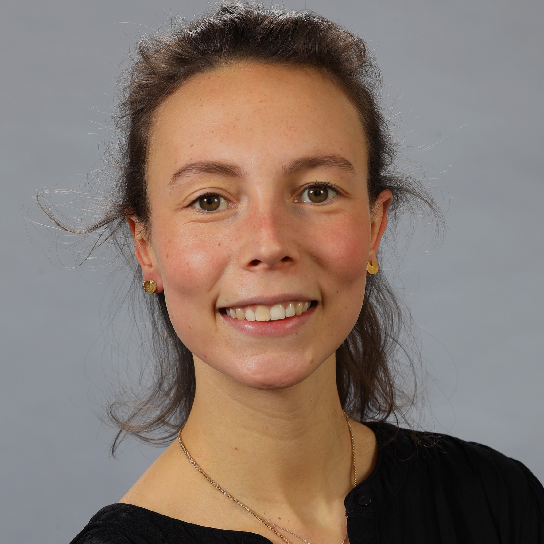 Dr Laure Verstraeten smiling at camera