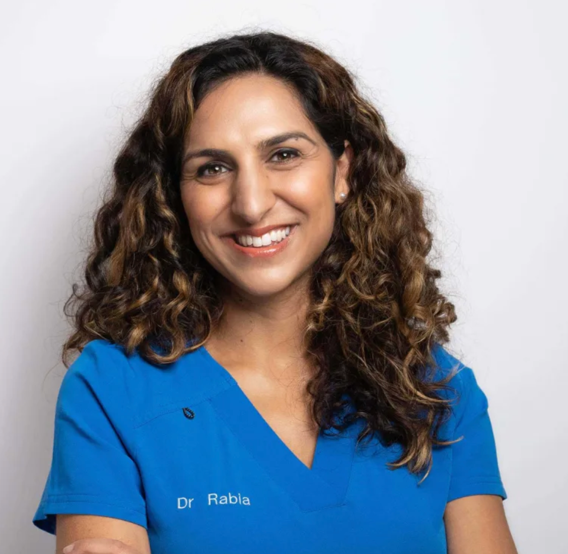 Dr Rabia smiling at camera