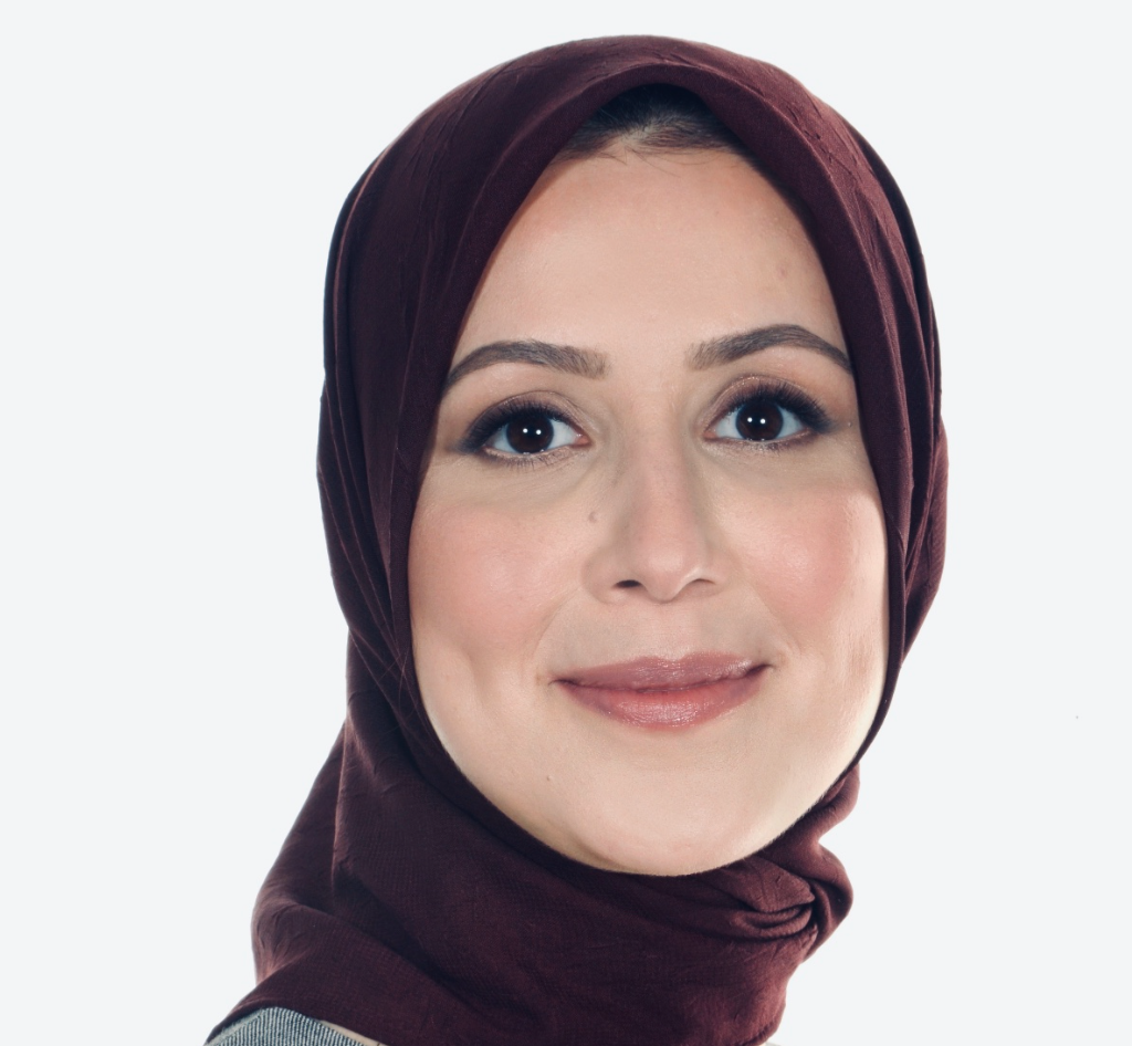 Dr Zainab smiling at camera