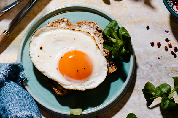 Egg on a blue plate