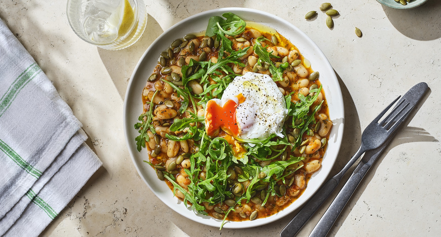 Egg and lentil chickpeas in a bowl on kitchen surface