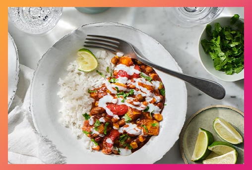 energy hub gradient border surrounding image of lentil bean chilli and rice bowl to highlight the recipe boosting energy