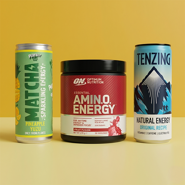 Energy drinks on yellow background