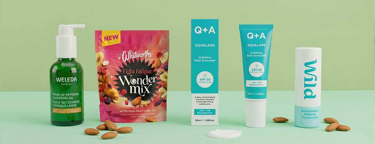 Selection of health and wellness products on green background