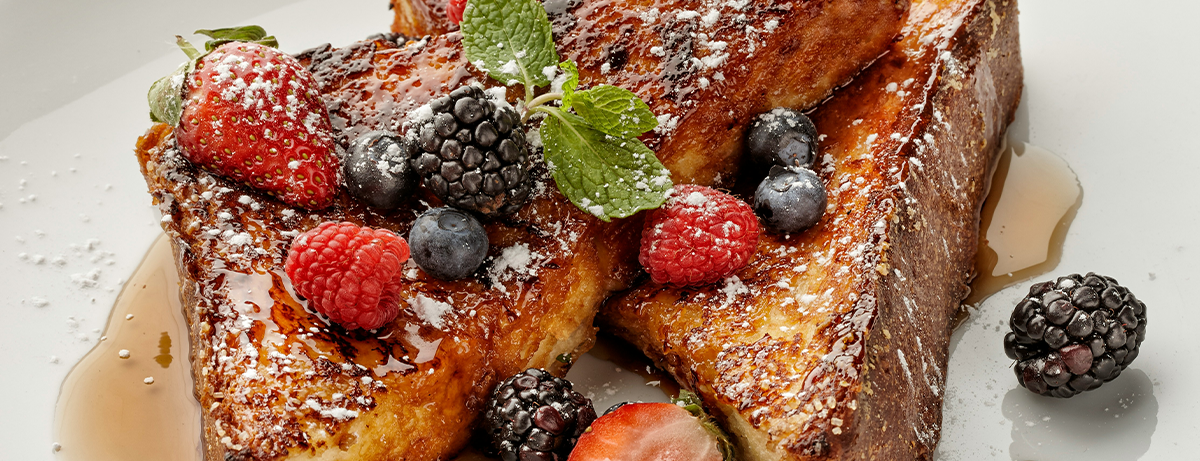French toast on a plate with berries