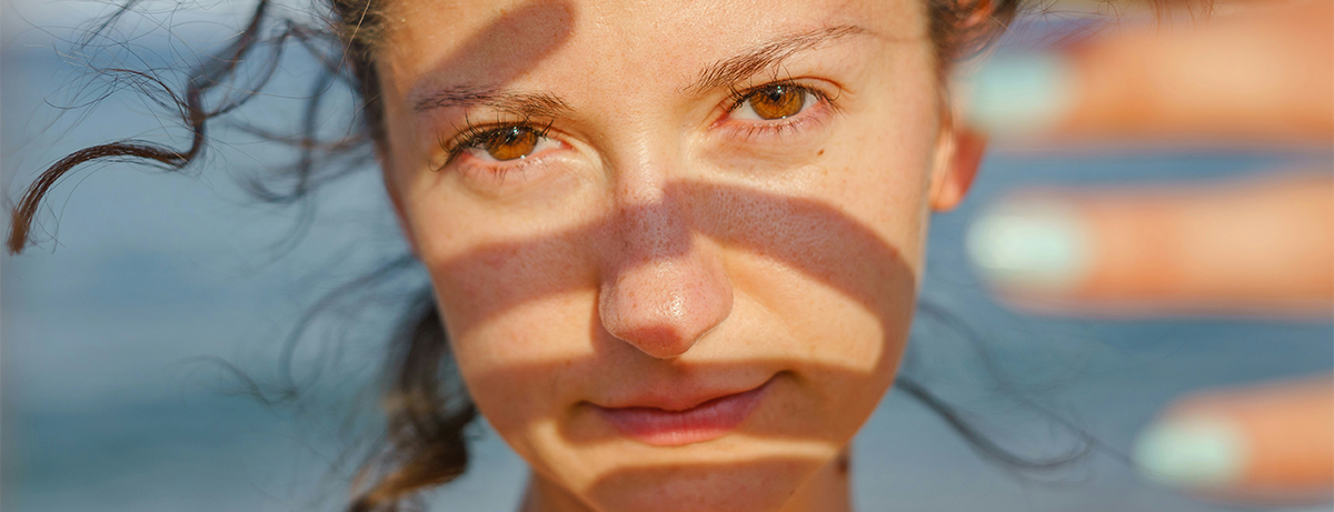 Female with blank expression looking into the camera
