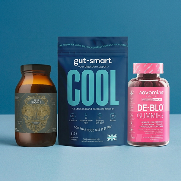 3 gut health products on a blue background