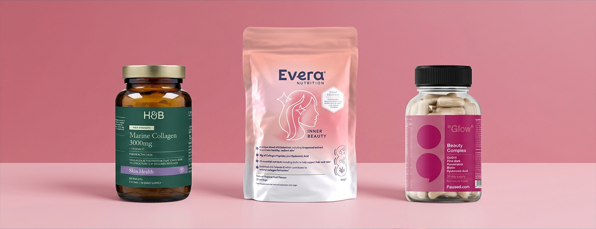 Selection of hair products on a pink background