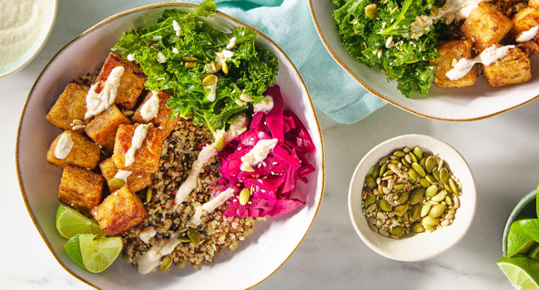 Tofu bites with kale in a white bowl