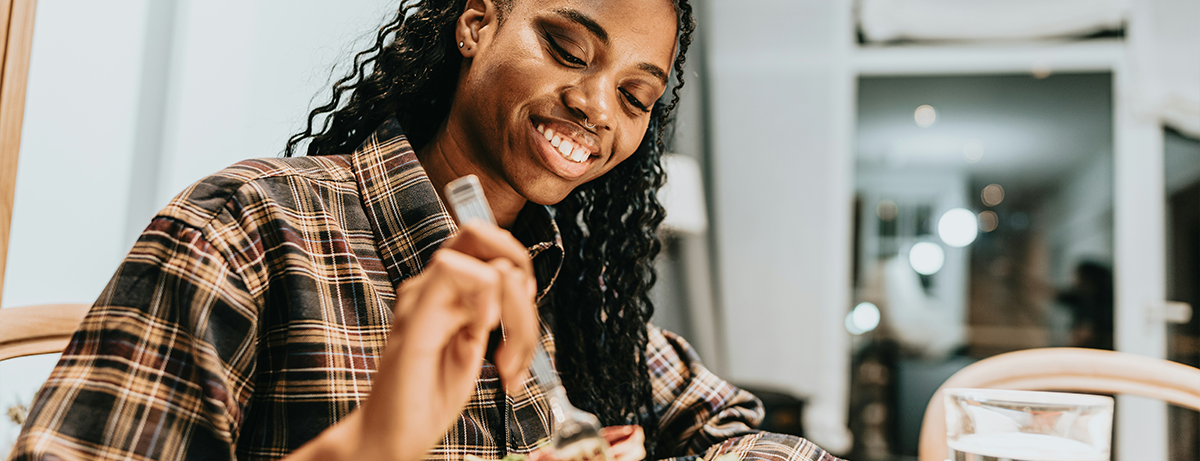 Female eating in dining room