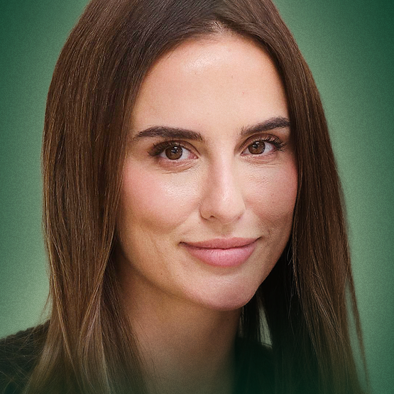 Lucy Watson smiling at camera