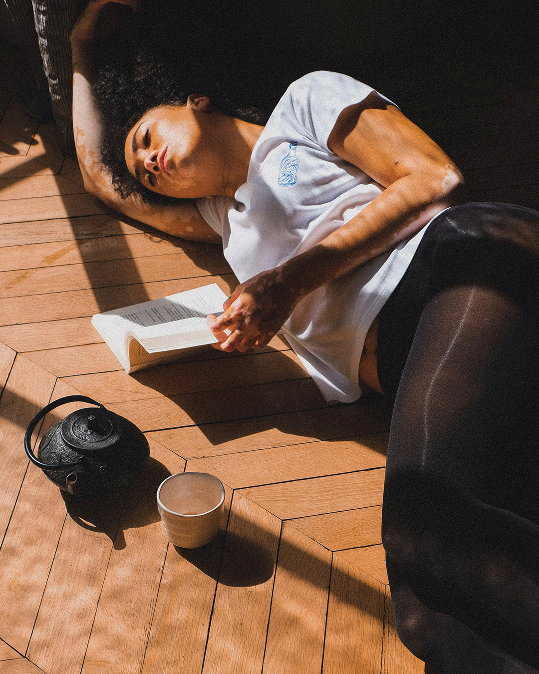 Female laying on the floor