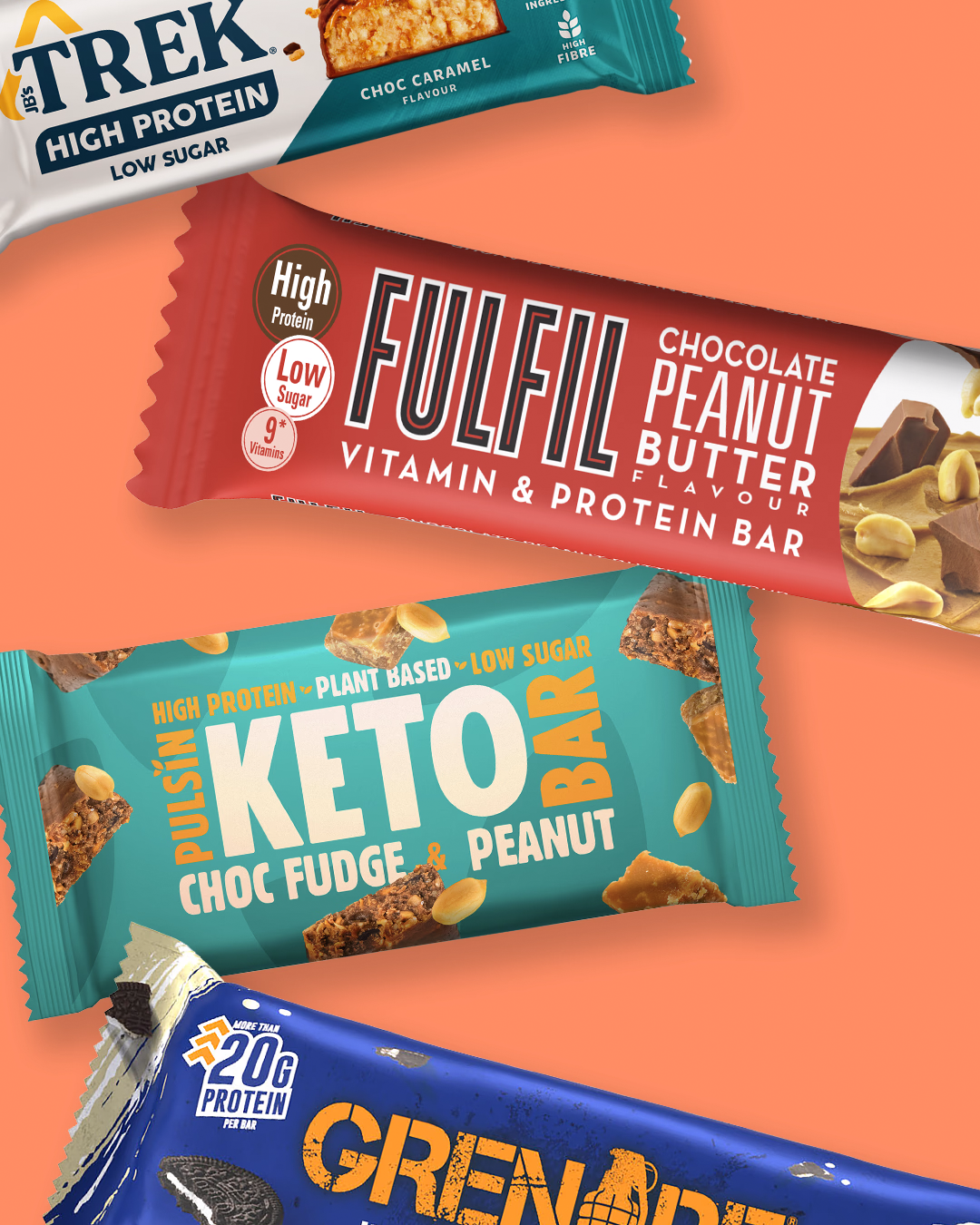 Selection of protein bars on a coral background