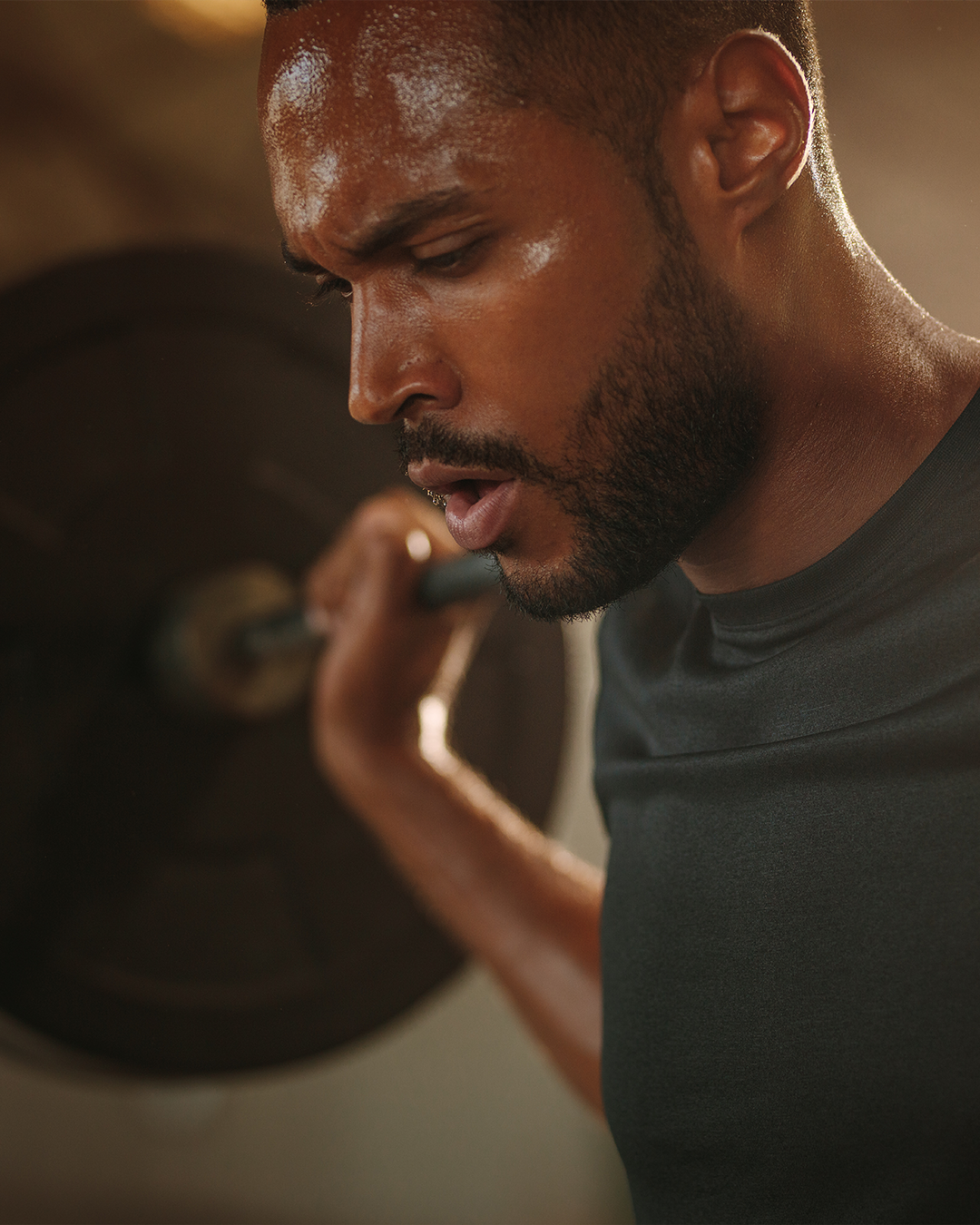 Male in the gym with squat rack
